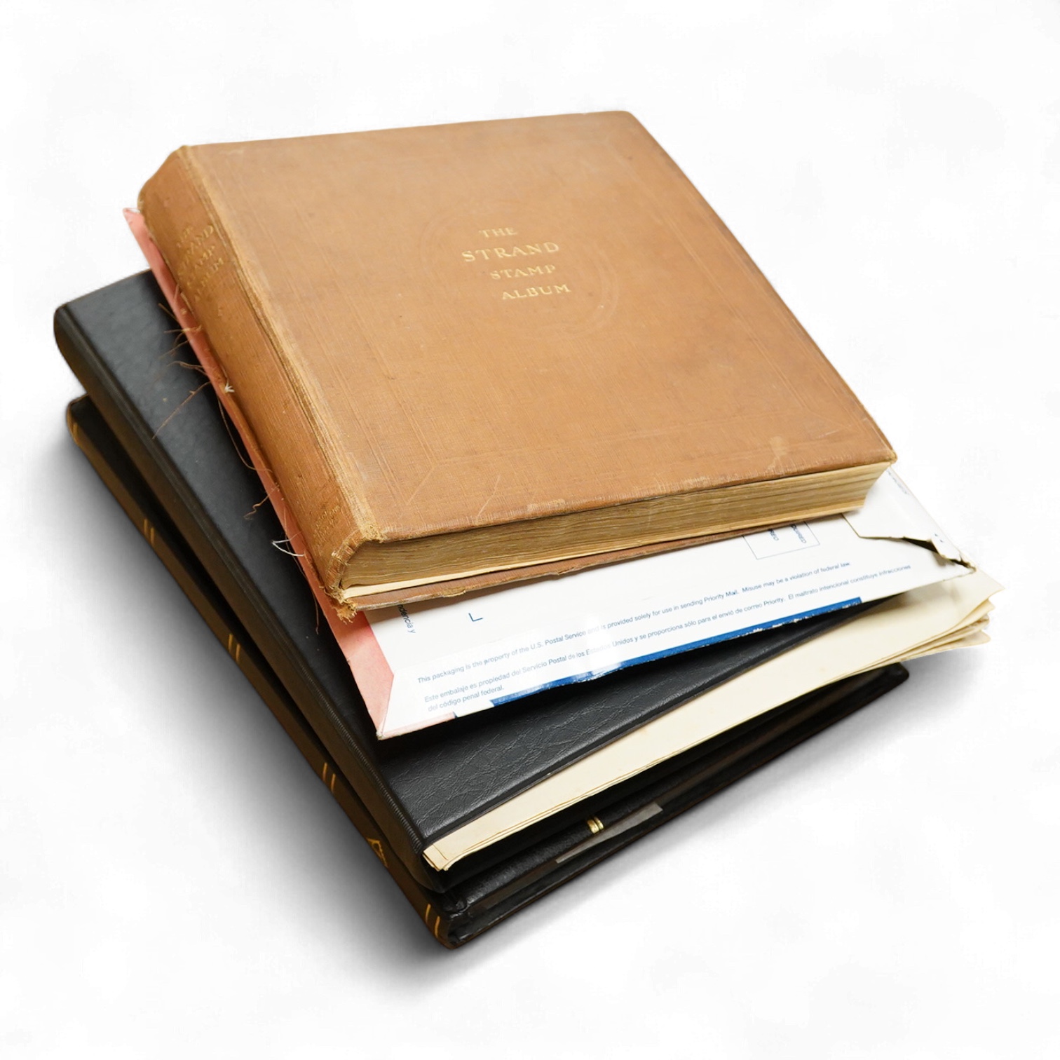 A stamp collection arranged in three albums including one Penny Black and world stamps to include Austria, France and America